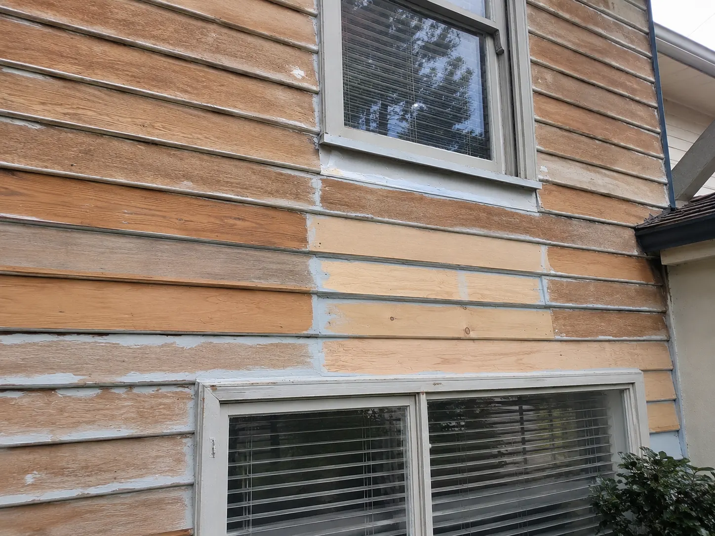 Weatherboard home in Highton during preparation — stripped, new boards installed, primed before exterior repaint